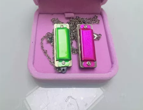 口琴项链情侣款包邮 能吹的 买回来一直放着...