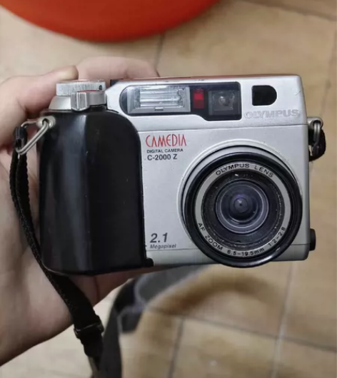 奥林巴斯c2000z ccd 上电池不开机...