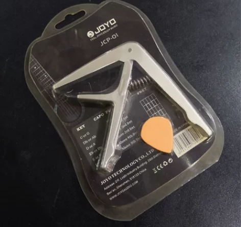 吉他变调夹,附带拨片。使用方便好用! 感兴...