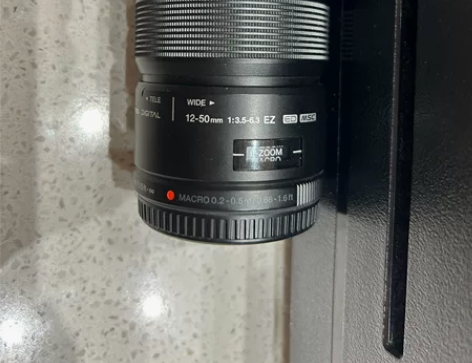 奥林巴斯12-50电动变焦镜头 感兴趣的话...
