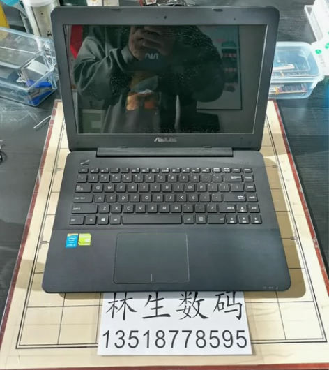 华硕14寸笔记本电脑，配件有:电脑包，无线...