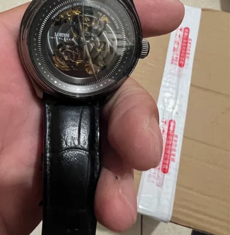 罗宾尼全自动机械表 镂空设计 走时正常 见...