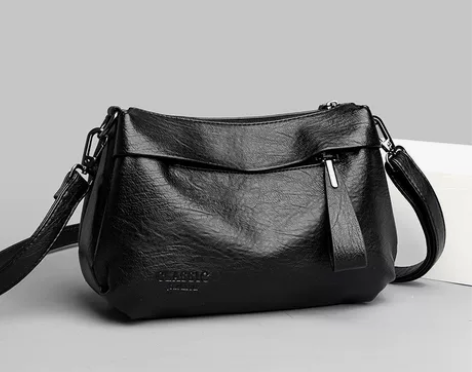 卡帝乐鳄鱼品牌真皮女士包包2024新款大容...