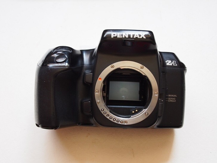 宾得Z-1，中等成色，特别先指出，电池仓角...