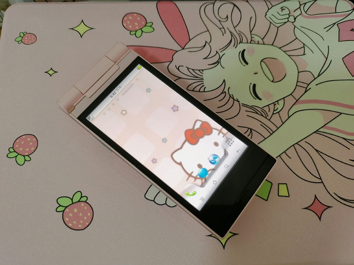 夏普粉色可旋转翻盖手机