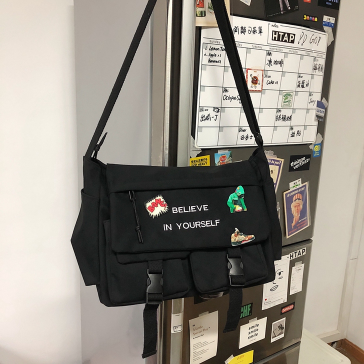 单肩包男士大容量斜挎包潮牌斜跨背包韩版大学...