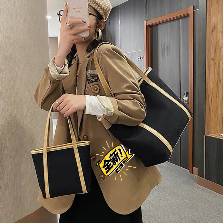 大容量单肩帆布包女2021新款通勤简约托特...