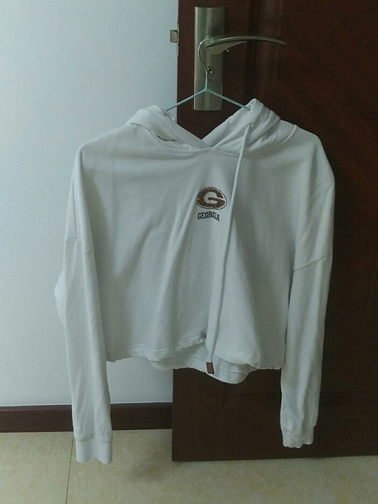 包邮白色长袖T恤衫 瑕疵如图 小的没看到不...