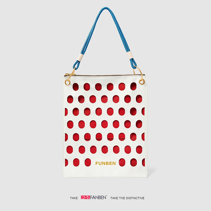 西班牙本小众设计时尚圆点镂空单肩包手拎包撞...