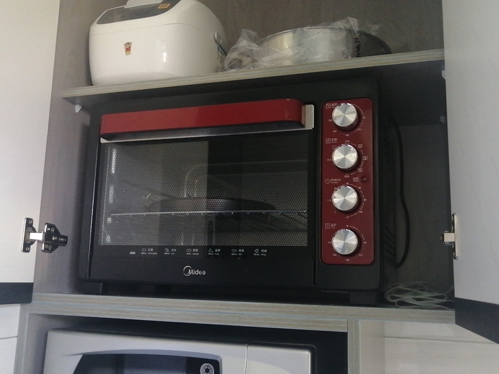 自家使用美的38L烤箱一个，搬家后柜子放不...