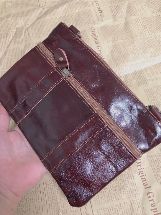 尼泊尔纯头层牛皮手拿包 手包小夹包尺寸：宽...