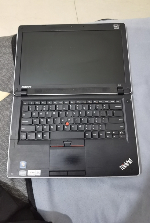 笔记本电脑的品牌是联想thinkpad，型...
