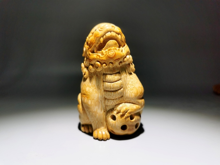 竹根雕. 狮子