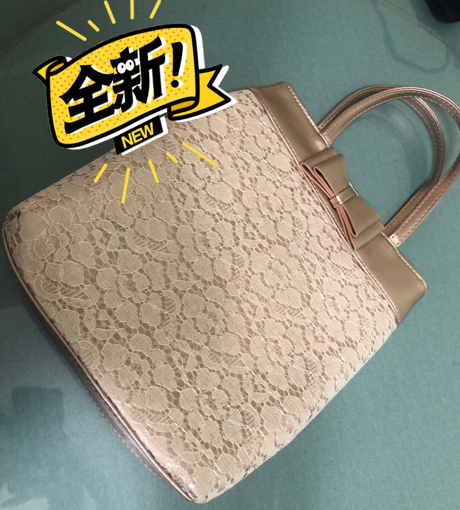 全新蕾丝女手提包，材质:十字纹PU，颜色：...