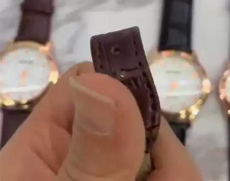 石英手表 石英情侣腕表，黑带和棕带两款，吐...