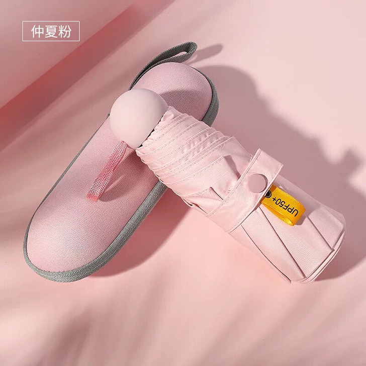 子非防晒胶囊五折防紫外线折叠黑胶8骨太阳伞...