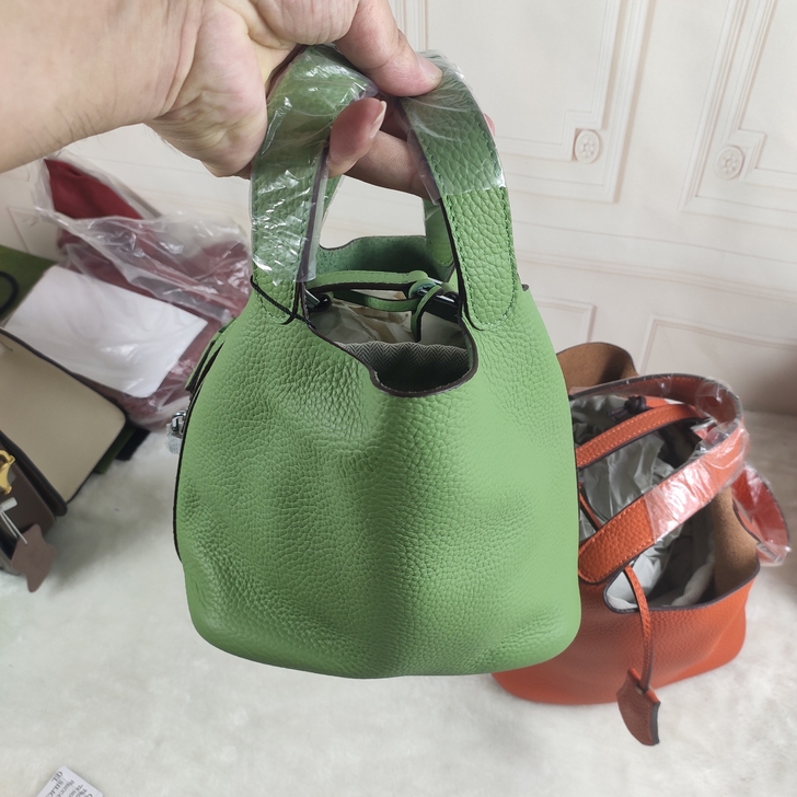 捡漏！！！真皮女包。爱玛士同款手提包