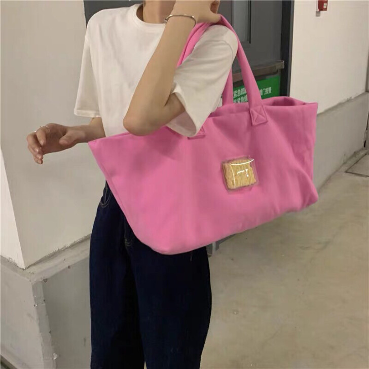 手提包包女2021新款网红同款泡面包呢子方...