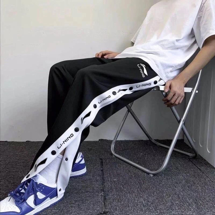 排扣裤夏季新款高街休闲运动宽松束脚裤男女情...