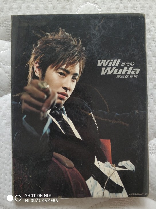 潘玮柏第三张专辑WuHa，2004年发行，...