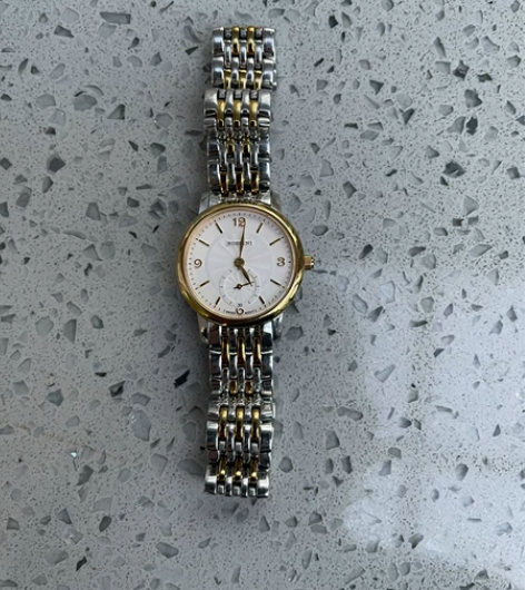 罗西尼超薄女表，石英表，走时正常。不退不换...