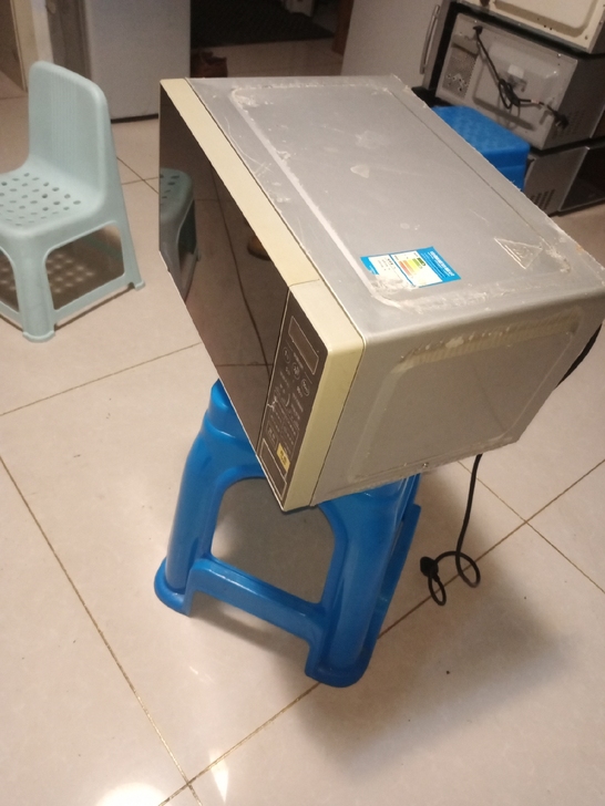 美的微波炉，表面保护膜还没撕下来，加热快，...