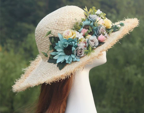 包邮夏季女花朵草编帽沙滩帽大檐帽海边度假遮...