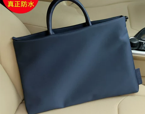 手提包适用联想苹果惠普macbook小新a...