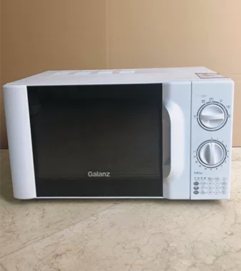 白色格兰仕机械式微波炉，旋钮调节，里面玻璃...