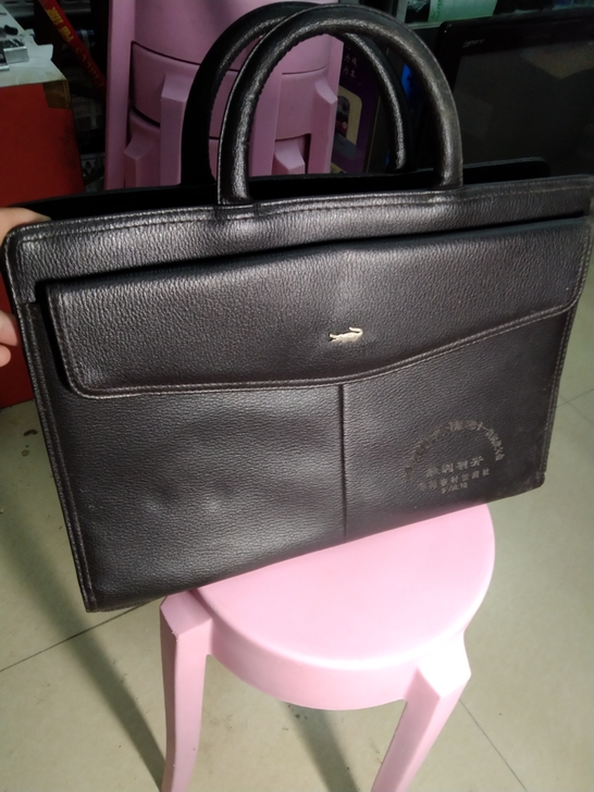 纪念公文皮包未成使用做工扎实15年的历史皮...