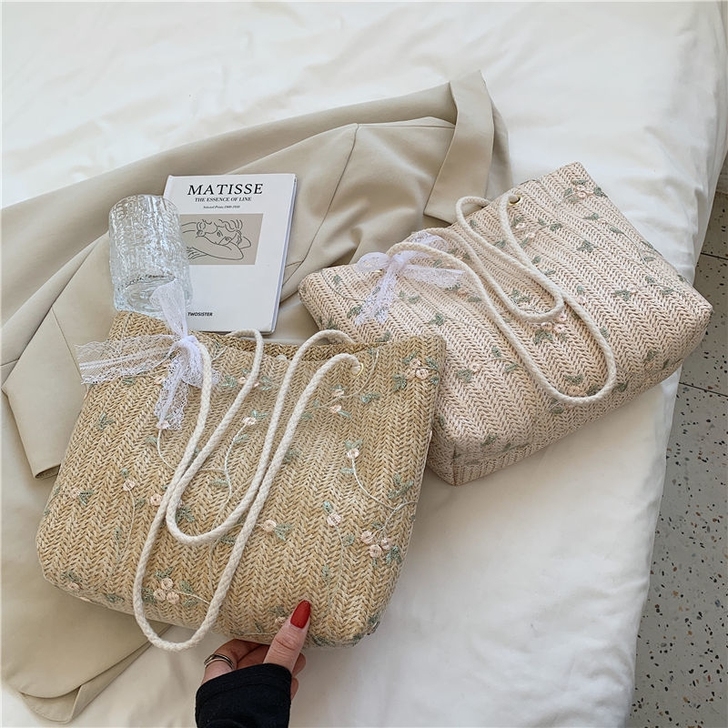 草编蕾丝单肩托特包夏季大容量蝴蝶结小清新编...