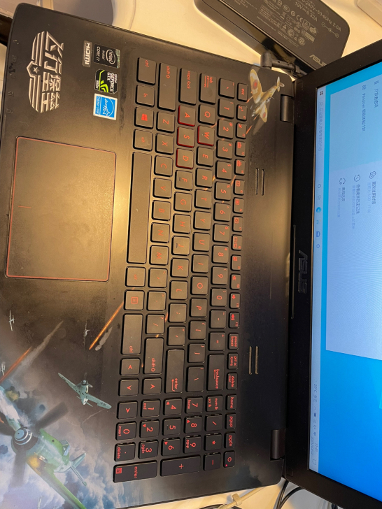 华硕gl552jx 华硕飞行堡垒,和前面的...