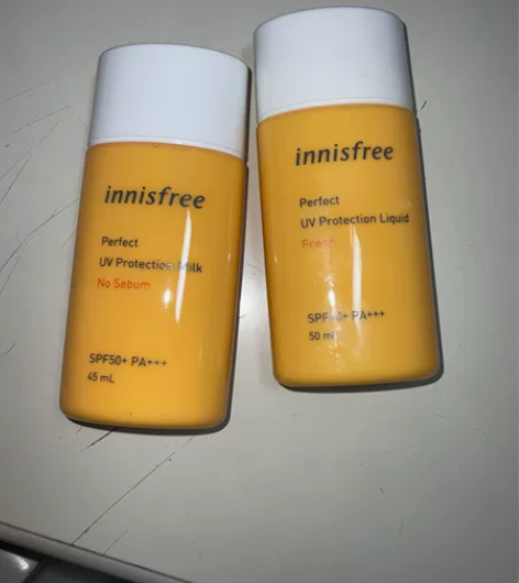 出两罐悦诗风吟防晒，清爽控油不闷痘，仅用过...