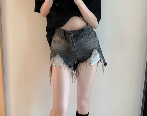 水洗做旧破洞毛边牛仔裤女夏季薄款热裤a字短...