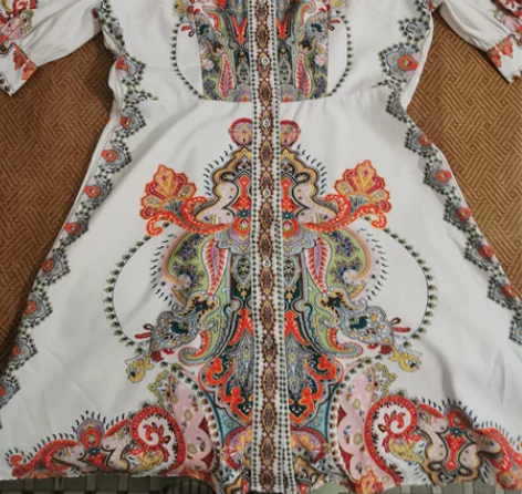 请衣柜～及膝M码印花中裙 感兴趣的话点“我...