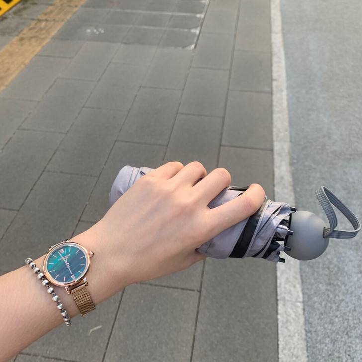 出一个小绿表 皮带的 购买一年佩戴半年 表...