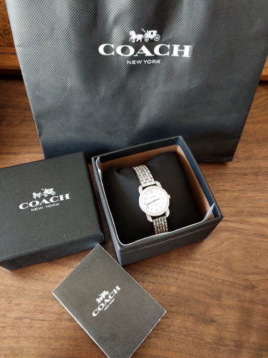 coach的满钻手表