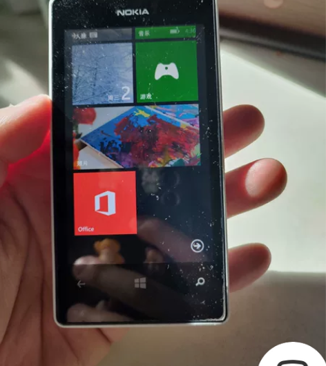 诺基亚521 不读卡 按键掉了 开机和拍照...