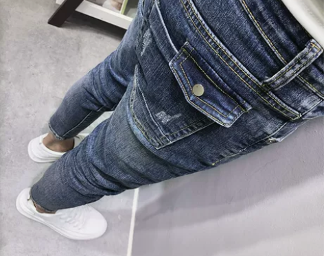 ins工装个性口袋水洗蓝小脚牛仔裤 潮男春...
