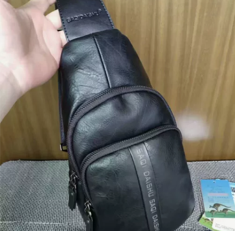 全新袋鼠真皮牛皮男的胸包，之前开店剩下十几...