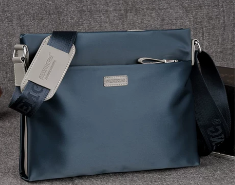 男包单肩包牛津纺男包斜挎包大容量帆布男包运...