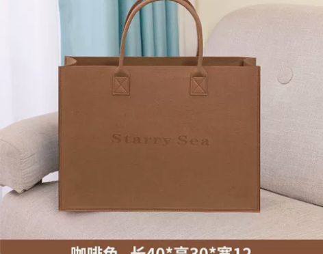 全新咖啡色毛毡手提包 感兴趣的话点“我想要...