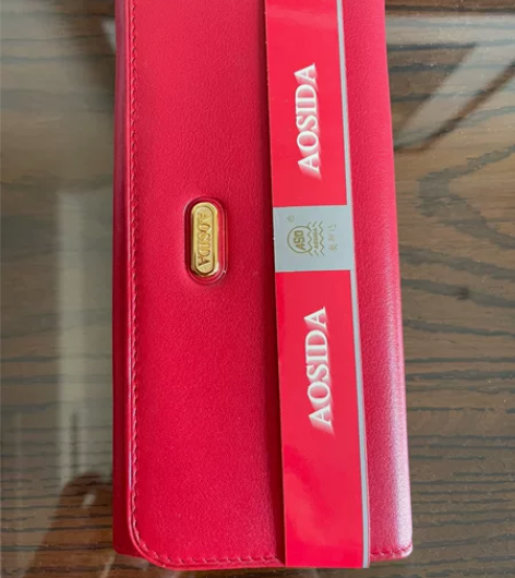 奥斯达长款全头层小牛皮。  红色长款钱包 ...