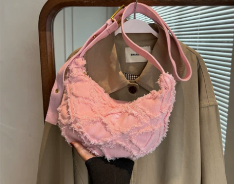 ?粉红色帆布包包女2022新款百搭ins斜...