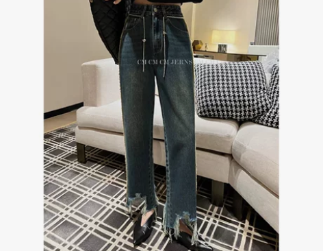 CM裤脚不规则流苏牛仔裤女2022秋新款高...