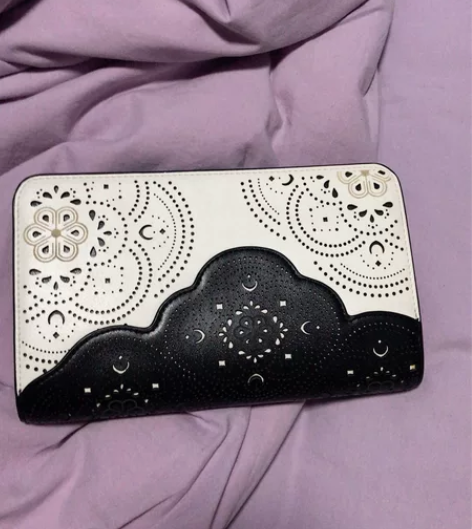 马连奴奥兰迪真皮复古女士拉链镂空气质手拿包...