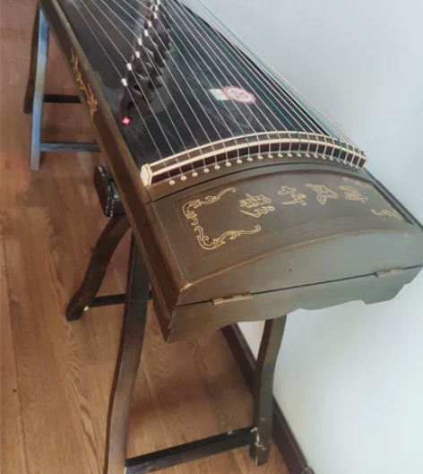 古筝,根新的一样,可刀,同城自提。哄孩子玩...