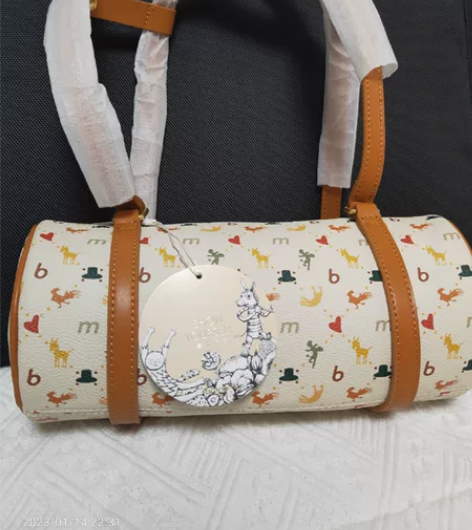 实拍图，全新不莱玫法棍包复古老花圆筒枕头包...