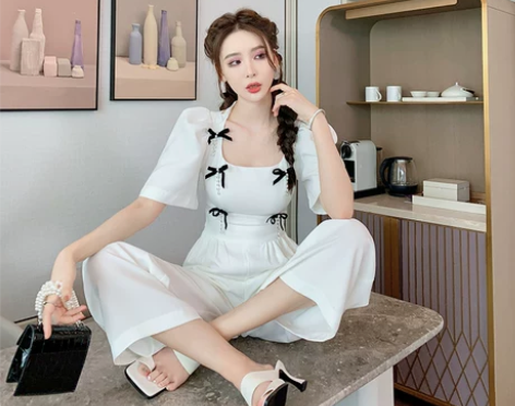 长款白色连体衣女装气质名媛时尚白色休闲阔腿...