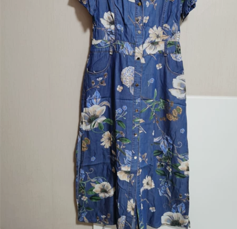 再生纤维面料牛仔风 下摆两侧开叉两口袋 面...